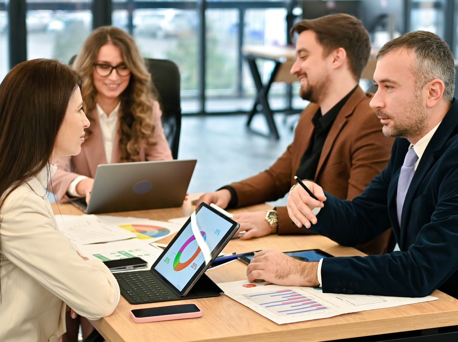 Advisors meeting in a modern office